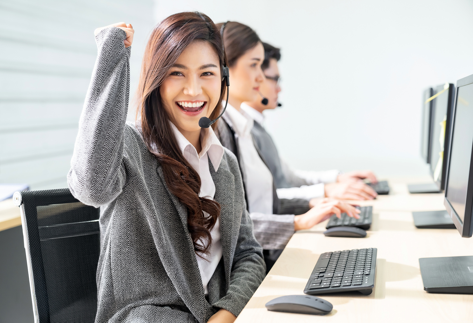 Smiling call Center working